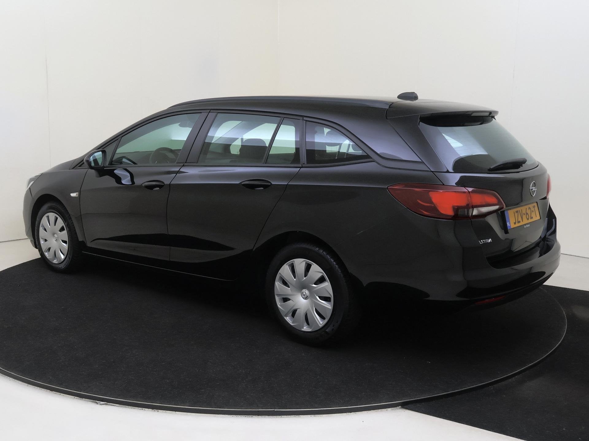 Opel Astra Sports Tourer 1.2 Business Edition Airconditionin, Auto's, Opel, Voorwielaandrijving, Stof, Gebruikt, 1199 cc