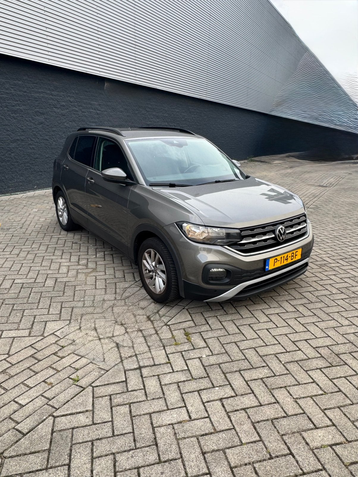 Volkswagen T-Cross 1.0 TSI 110pk 7-DSG 2021 Grijs camera, Auto's, Zwart, 19 km/l, Particulier, 1198 kg