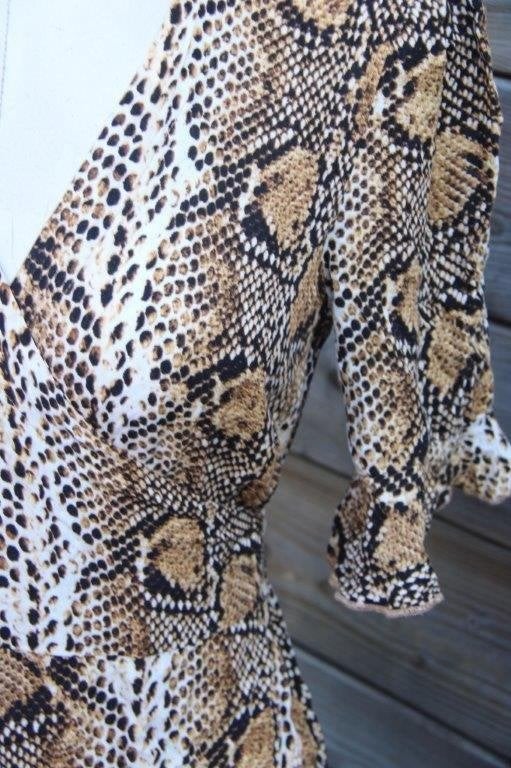 Wikkeljurk creme/ bruin/ zwart Summum mt S Vaste prijs, Kleding | Dames, Summum, Zwart, Ophalen of Verzenden, Zo goed als nieuw
