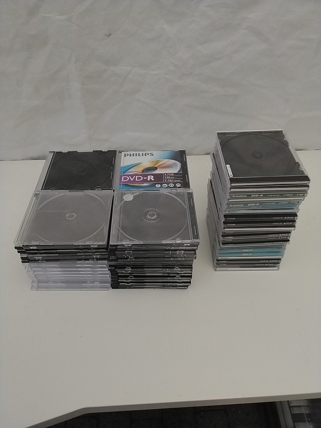 100 dunne en 21 dikke lege DVD/CD hoesjes, Ophalen of Verzenden