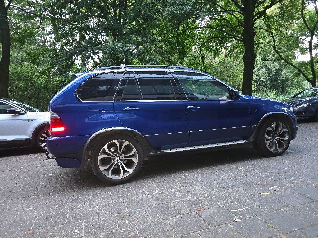 BMW X5 4.8 I AUT 2005 Blauw, Auto's, Automaat, 2175 kg, Blauw, Vierwielaandrijving