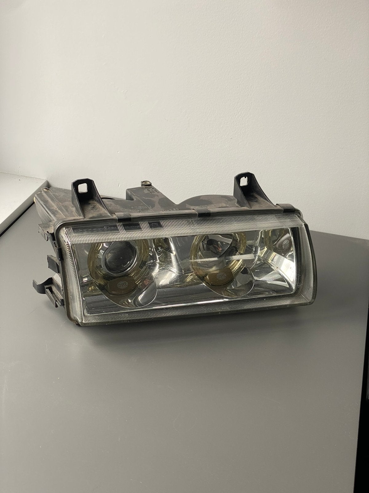 Originele BMW E36 Hella koplamp met angel eyes, Auto-onderdelen, Ophalen of Verzenden, BMW