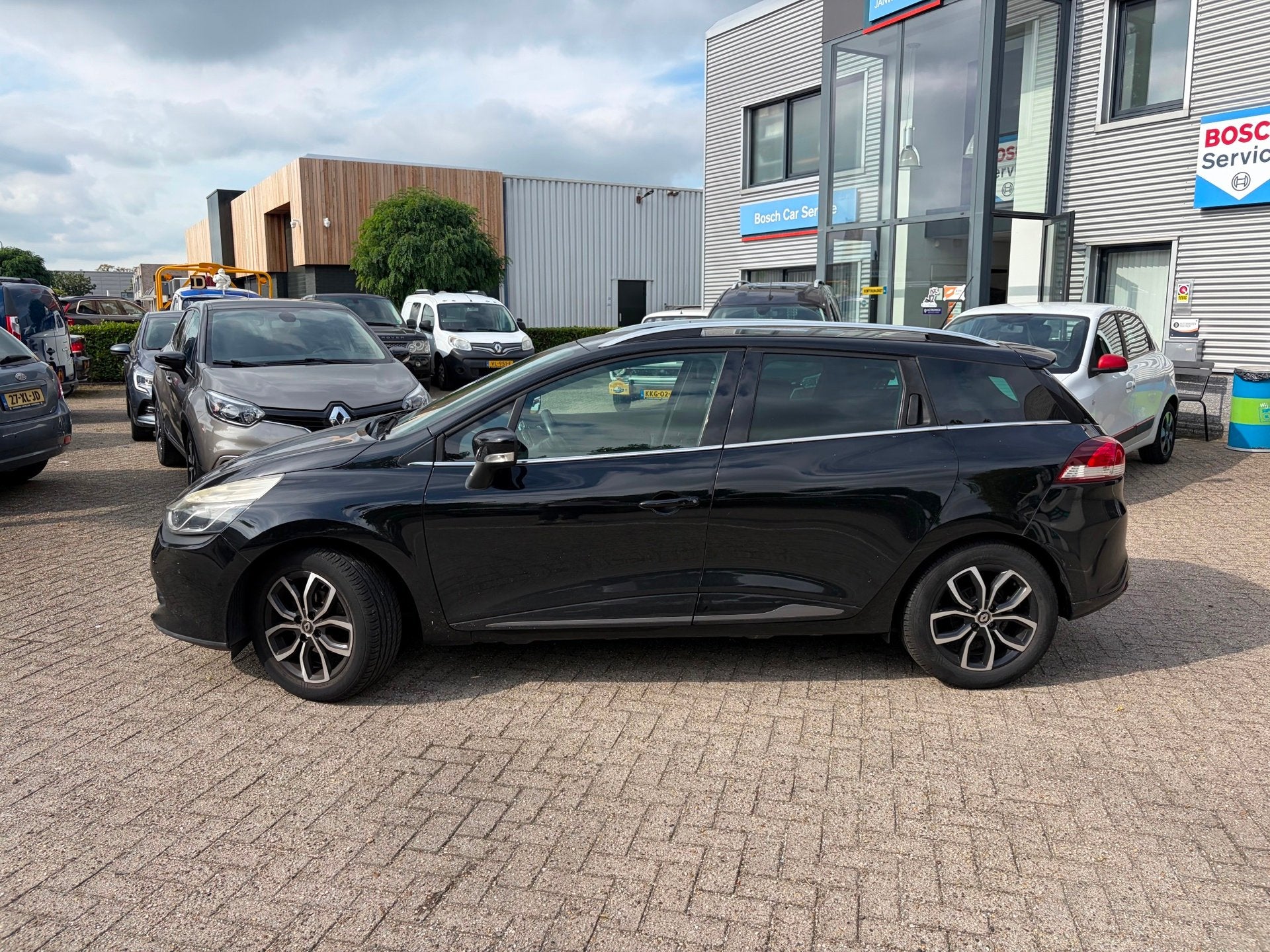 Renault Clio Estate 0.9 TCe Night&Day, Stof, Zwart, Met garantie (alle), Zwart