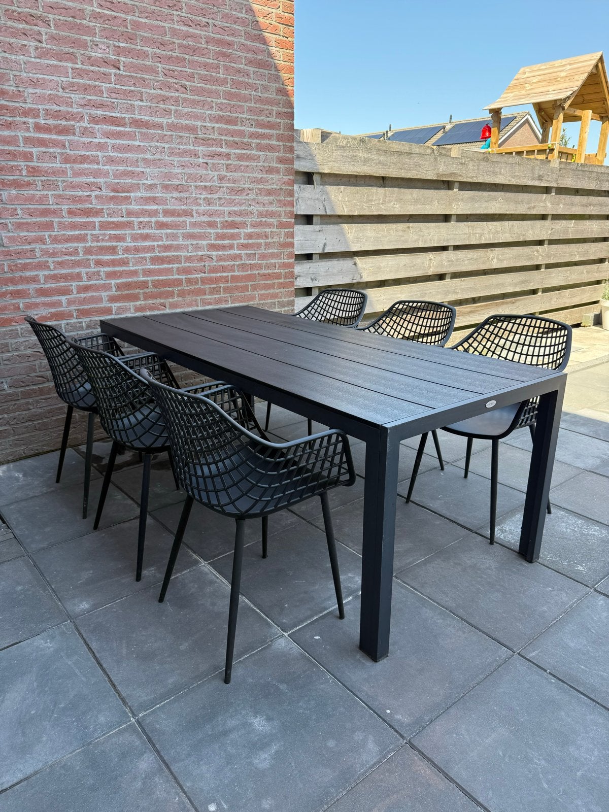Tuintafel met 6 kunststof stoelen, Ophalen, Kunststof, Gebruikt, Eettafel