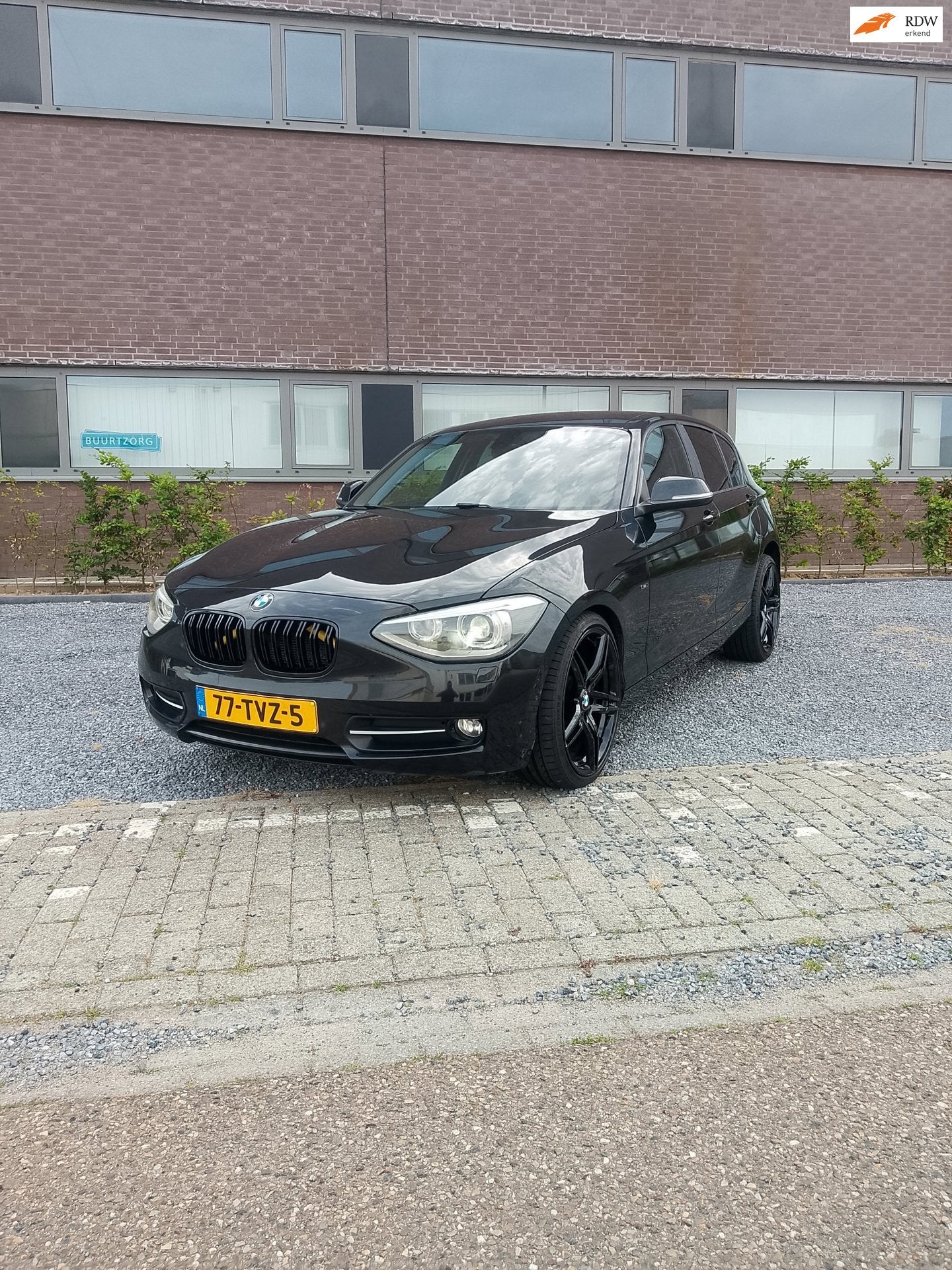 BMW 1-serie 116i Business+, Auto's, Euro 5, Gebruikt, 4 cilinders, Zwart