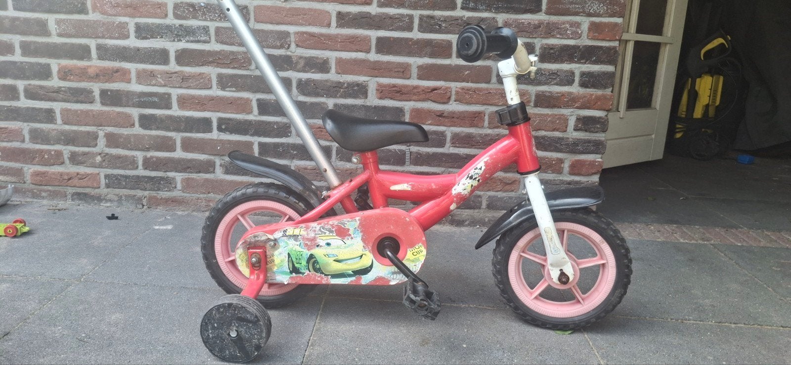 Kinderfiets 10 inch  rood met zijwieltjes en duwstang, Ophalen, Terugtraprem, Zijwieltjes, Gebruikt