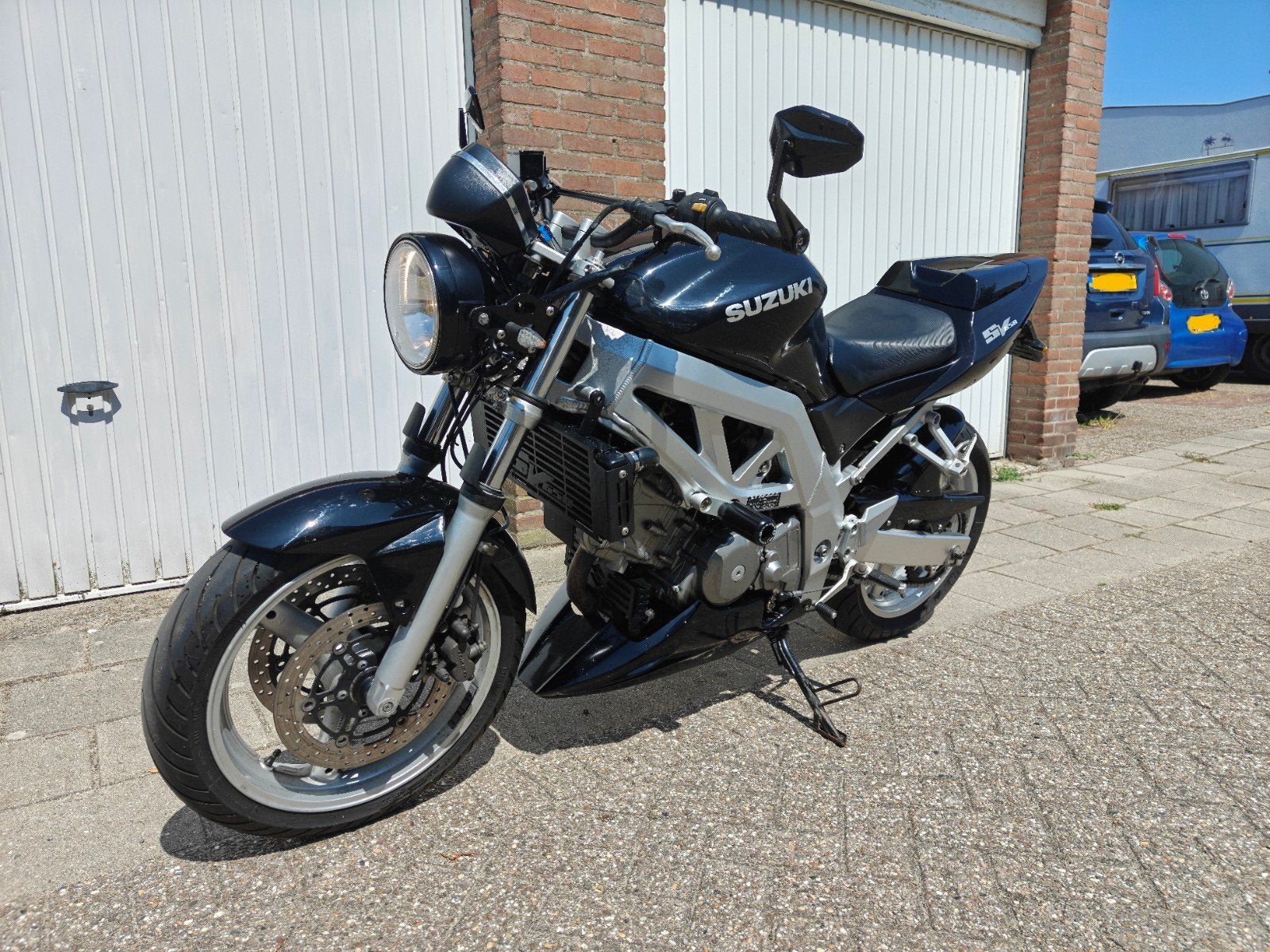 Suzuki sv650 naked bike 2003 zwart/zilver, Motoren, 2 cilinders, Sportuitlaat, Motorrijbewijs A, Gebruikt