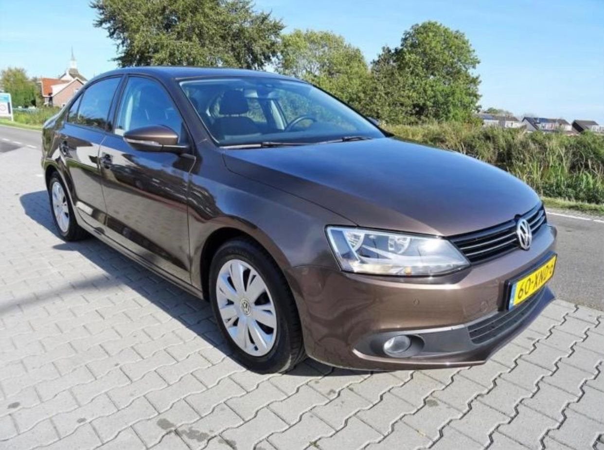 Volkswagen Jetta 1.2TSI 77KW H6 2012 Bruin, Auto's, Voorwielaandrijving, Zwart, 4 cilinders, Bruin