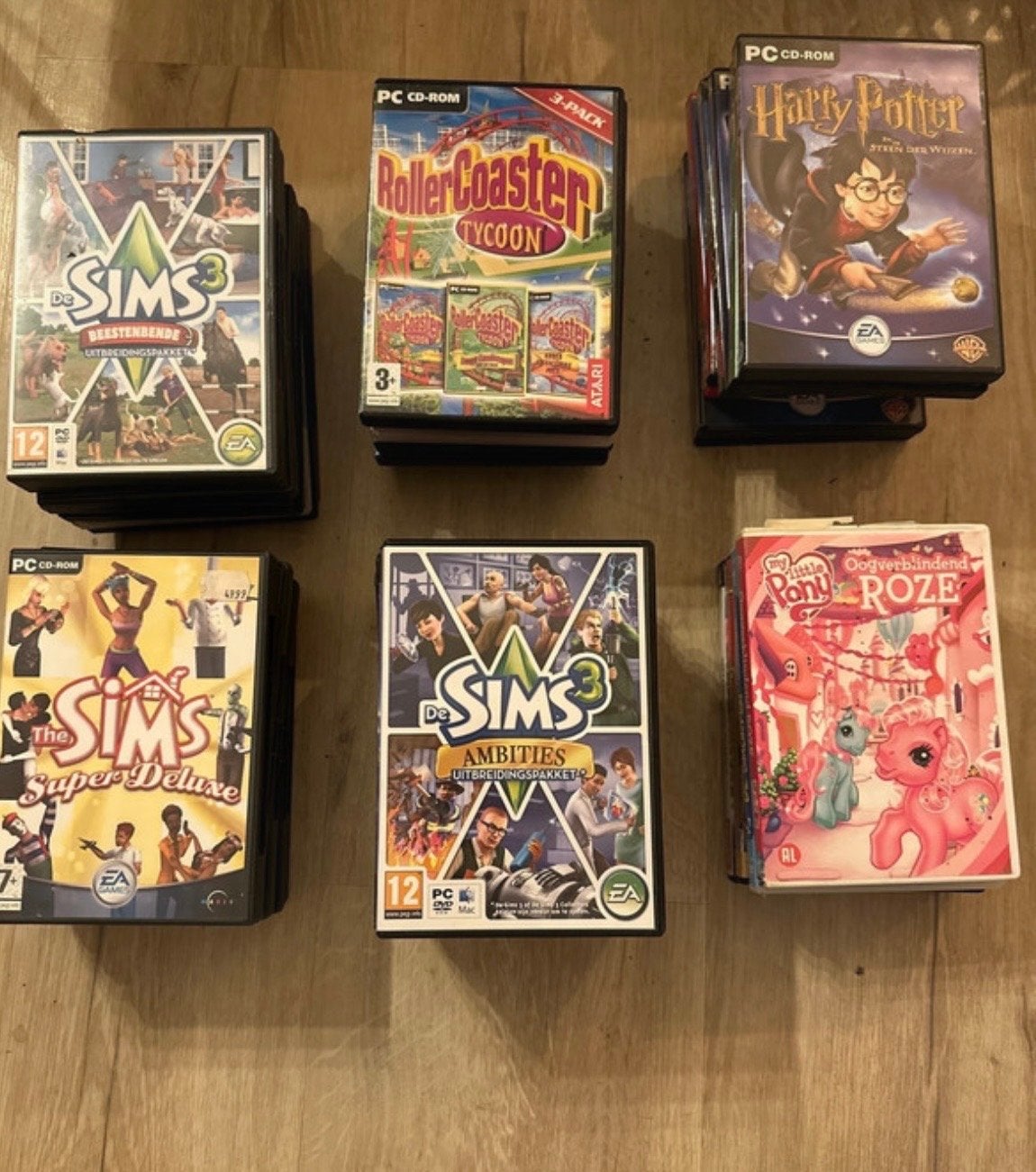 Bijna 45 oude pc spellen - The Sims, RollerCoaster Tycoon, Gebruikt, 1 speler, Ophalen of Verzenden, Vanaf 12 jaar