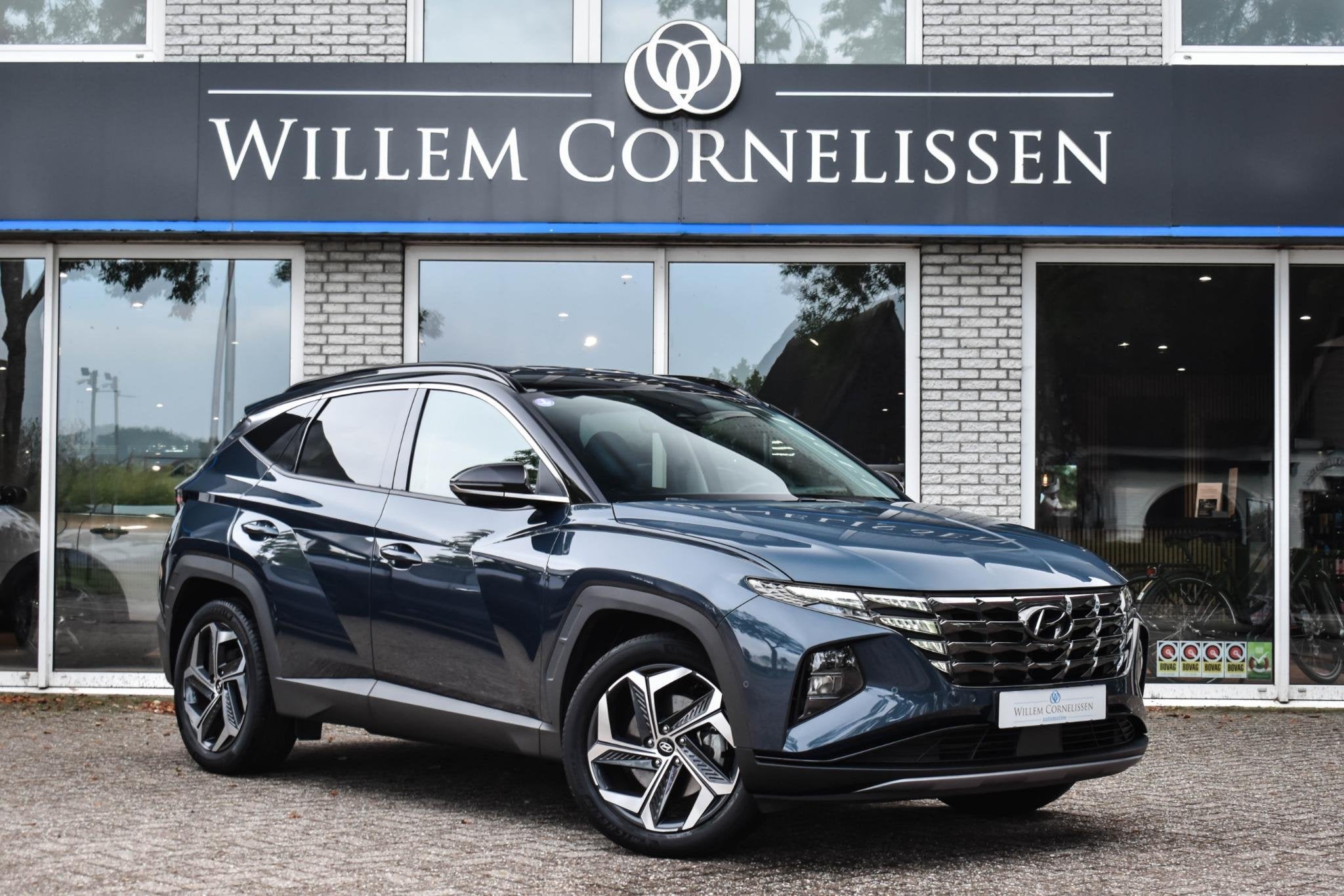 Hyundai Tucson 1.6 T-GDI HEV Premium Zitklima 360 Cam Leder, Auto's, Gebruikt, 4 cilinders, Blauw, 1650 kg