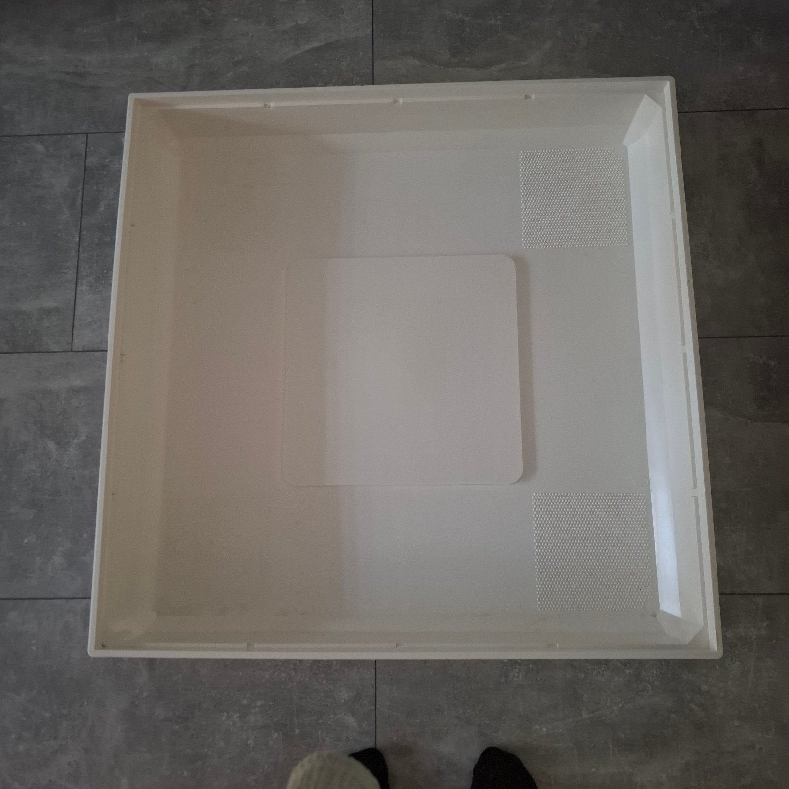 Lekbak standaard wasmachine, Ophalen
