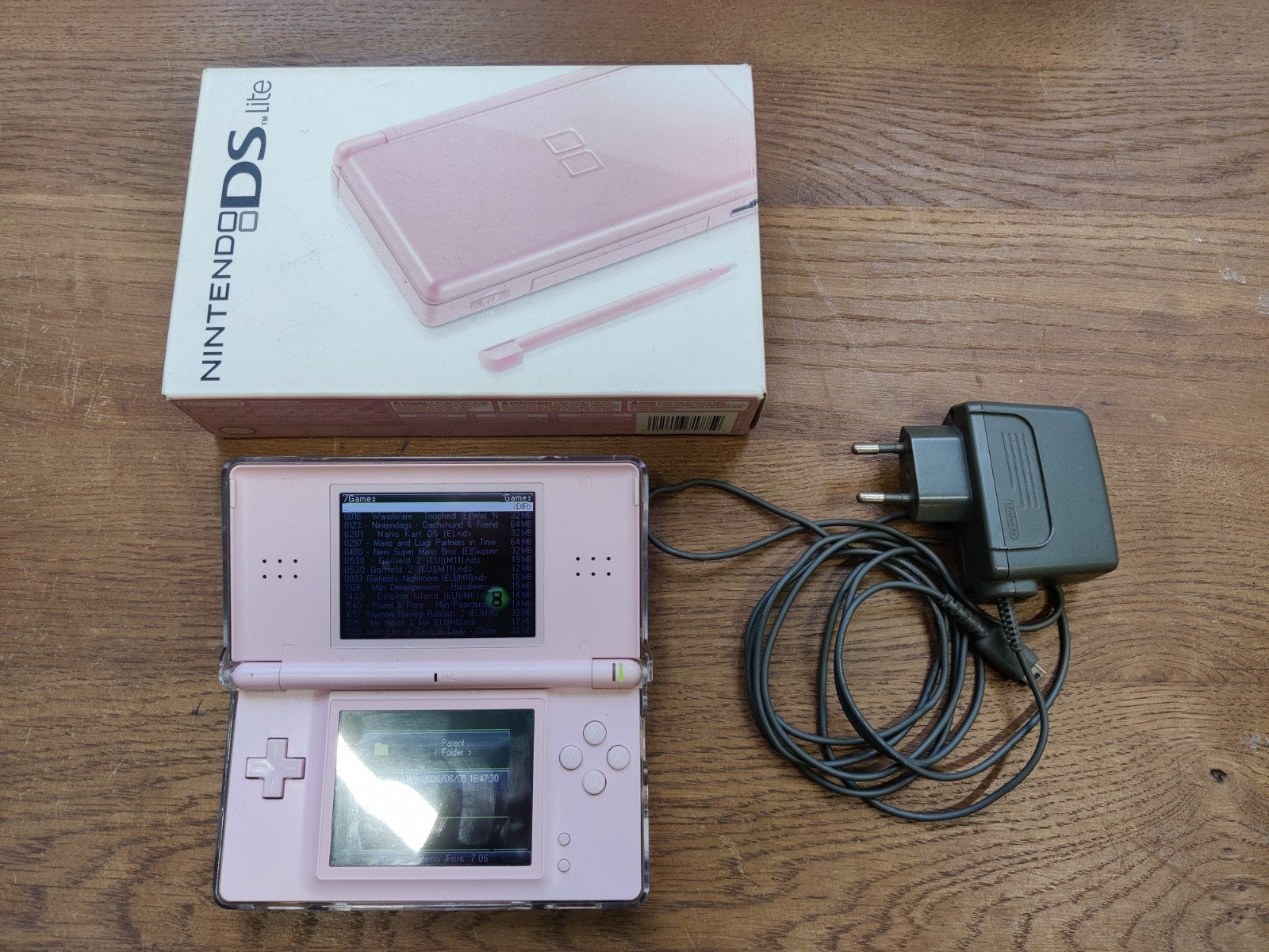 Nintendo DS Lite Roze met games, oplader en doos, Spelcomputers en Games, Met games, Ophalen of Verzenden, Zo goed als nieuw, Roze