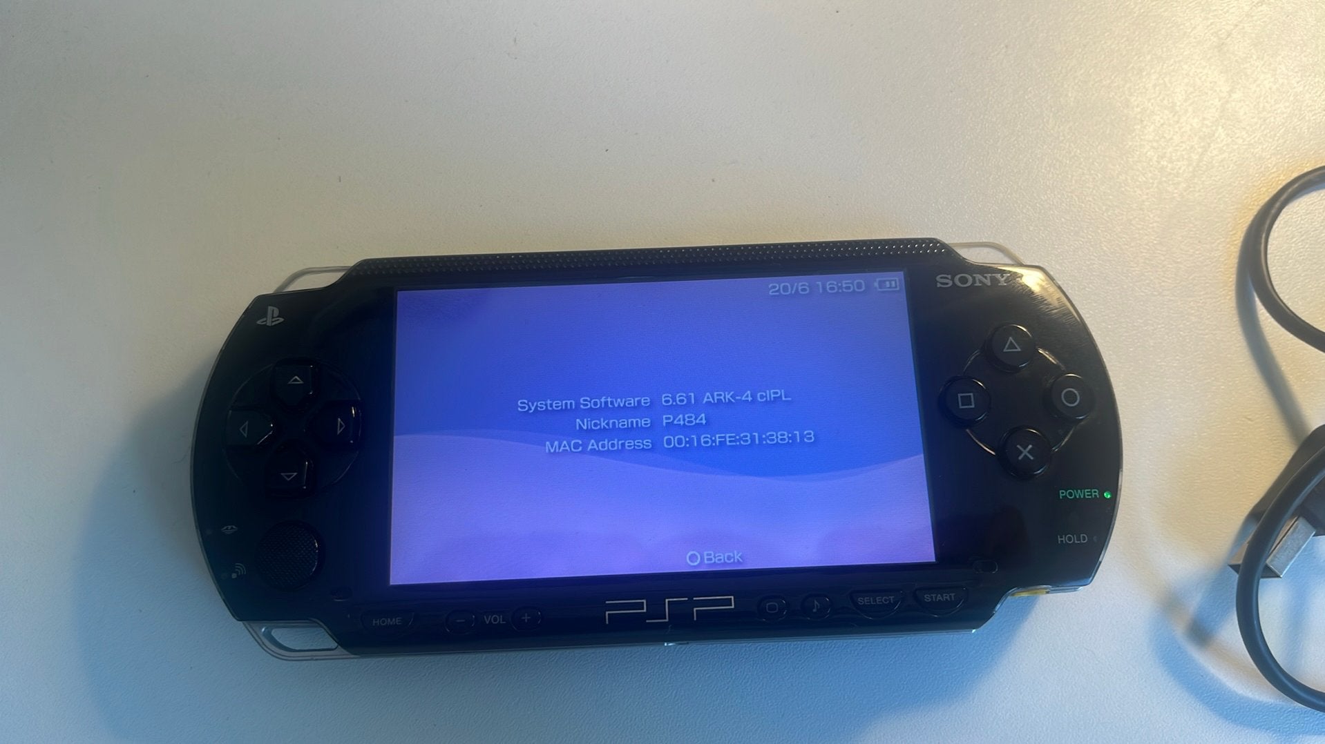 PSP 1000 met geïnstalleerde games en ark 4 custom firmware, Ophalen, Met games, Zwart, Zo goed als nieuw