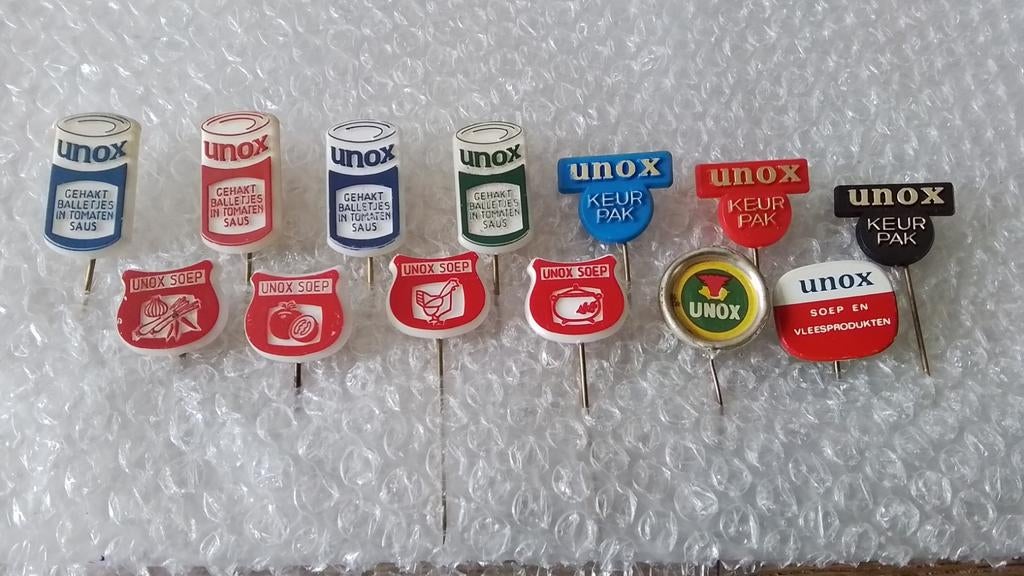 13 verschillende speldjes unox, Ophalen of Verzenden, Zo goed als nieuw, Overige onderwerpen