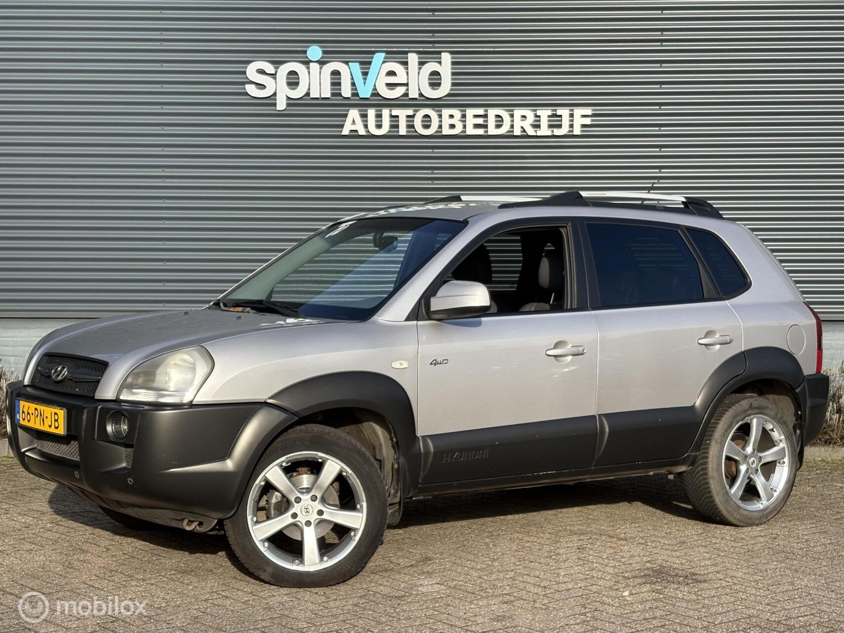 Hyundai Tucson 2.7i V6 4WD Style - Automaat - Climate - Nap, Auto's, Automaat, Gebruikt, 2656 cc, Bedrijf