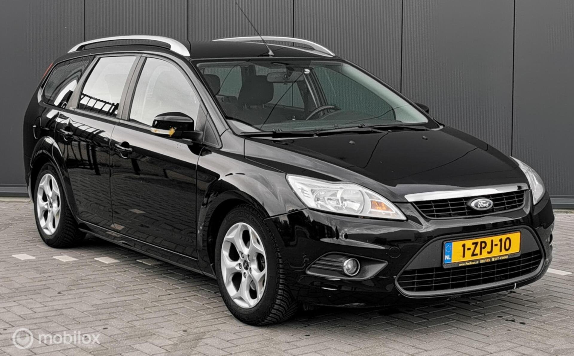 Ford Focus Wagon 1.6 Ghia 101PK/AIRCO/ELEKTR/CV/CRUISE/MTF/, Auto's, 1596 cc, Zwart, 635 kg, Zwart