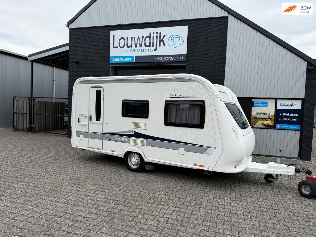 HOBBY De Luxe 440 SF ’11 (Mover, Vastbed 210cm), Caravans en Kamperen, Vast bed, Hobby, Bedrijf, Treinzit