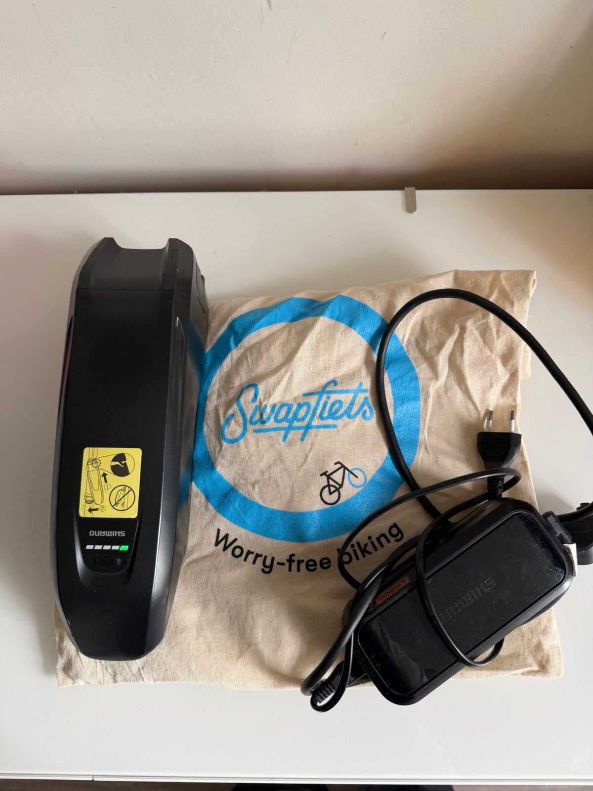 Swapfiets accu + oplader, Zo goed als nieuw