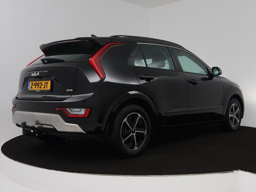 Kia Niro 1.6 GDi PHEV DynamicPlusLine Limited Stoel en stuur, Auto's, Kia, 12 maanden, Gebruikt, Leder en Stof, Zwart