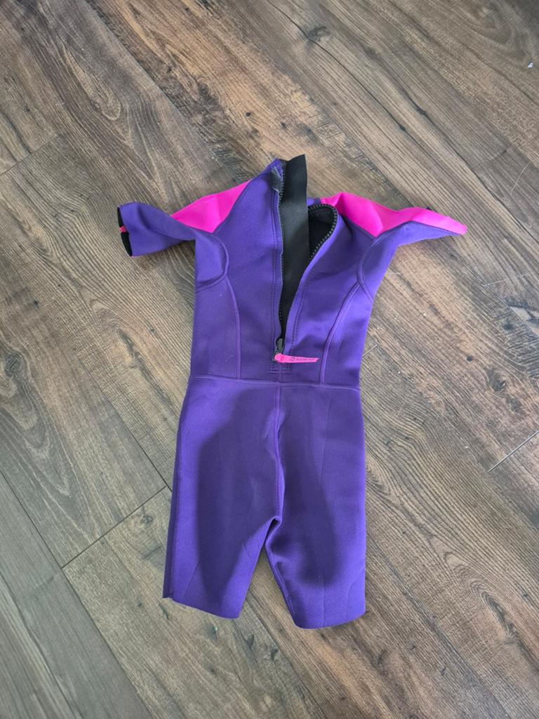 OLAIAAN Kinder wetsuit paars/roze - maat 6-8 jaar oud, Ophalen of Verzenden, Zo goed als nieuw, Overige onderwerpen, Geschikt voor kinderen
