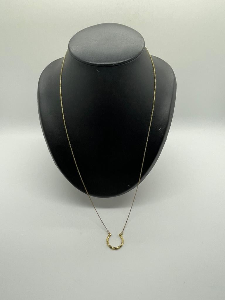 E70 Prachtige zilveren ketting goudkleurig, Met hanger, Ophalen of Verzenden, X, Goud