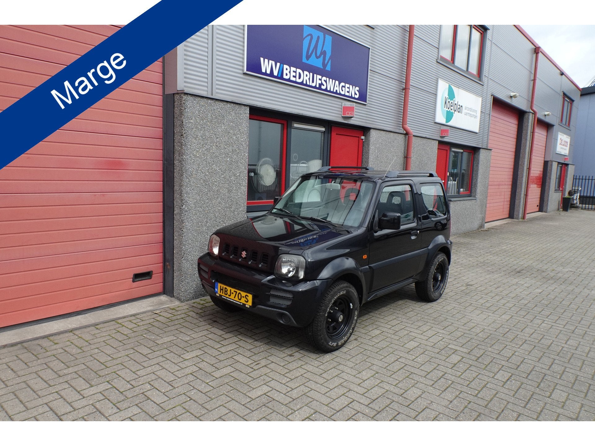 Suzuki Jimny 1.3 JX 4 x 4 127009 km (bj 2009), Auto's, Gebruikt, Zwart, 4 stoelen, Zwart