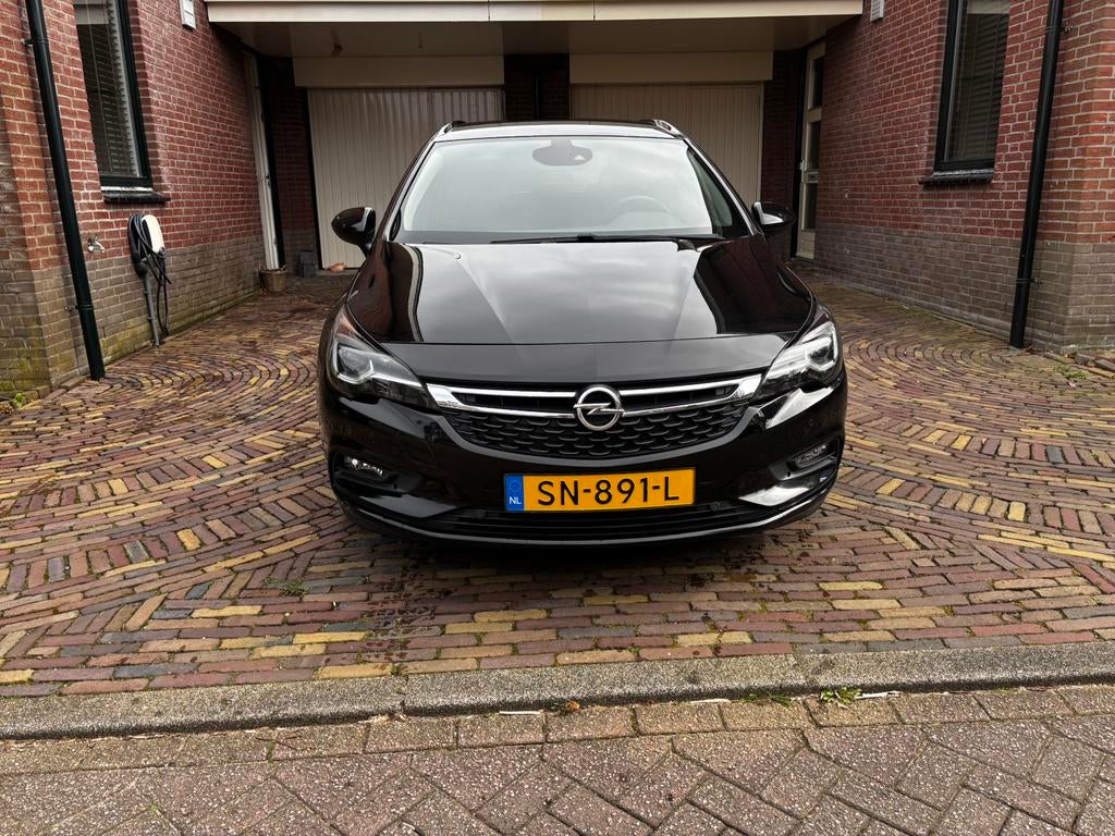Opel Astra 1.0 Turbo 77KW Sports Tourer 2018 Zwart, Auto's, 1178 kg, 620 kg, Zwart, Origineel Nederlands