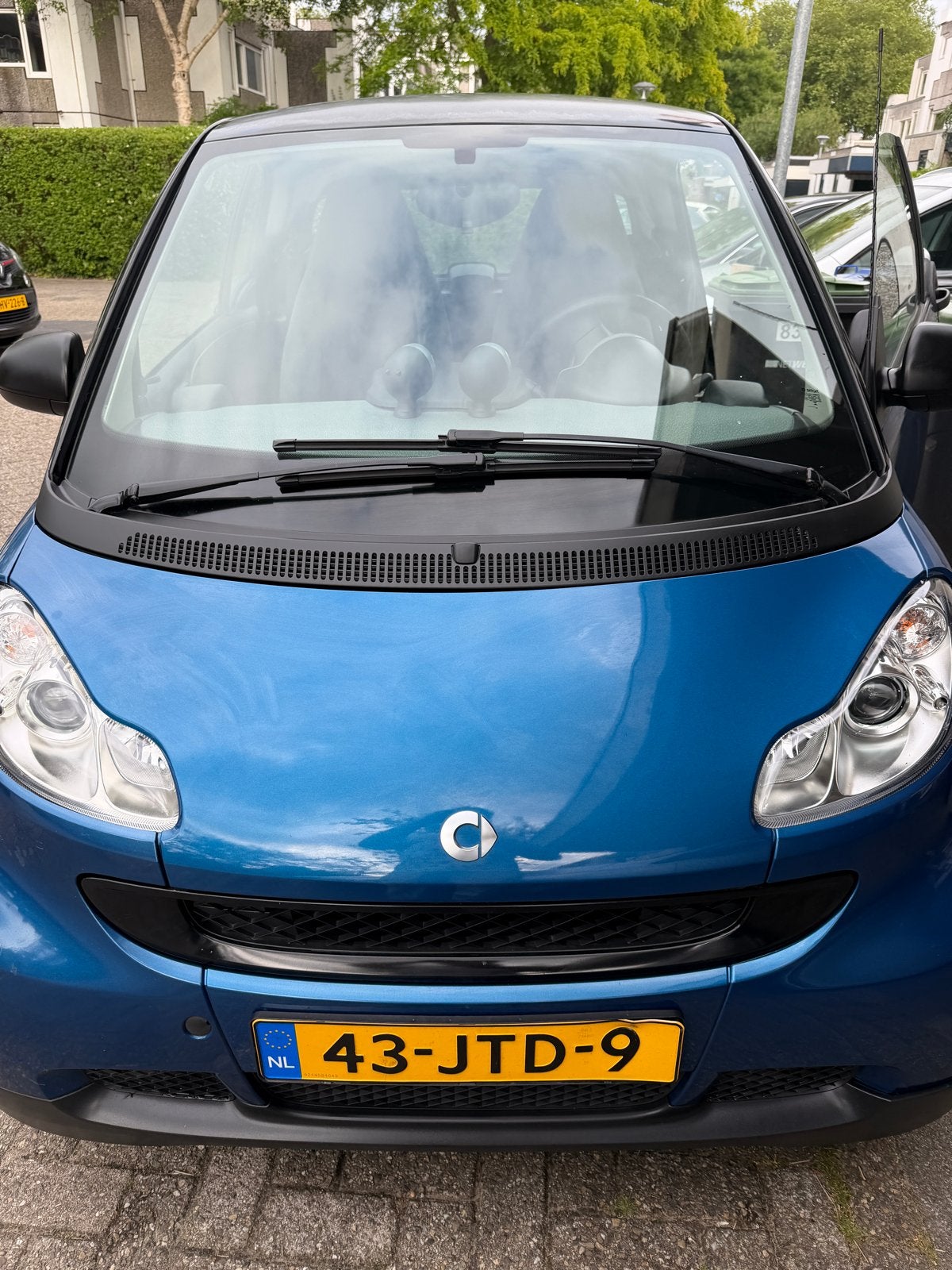 Smart ForTwo 1.0 45KW Coupe MHD AUT 2009 Zwart, Auto's, Smart, Stof, Euro 6, 18 €/maand, Blauw