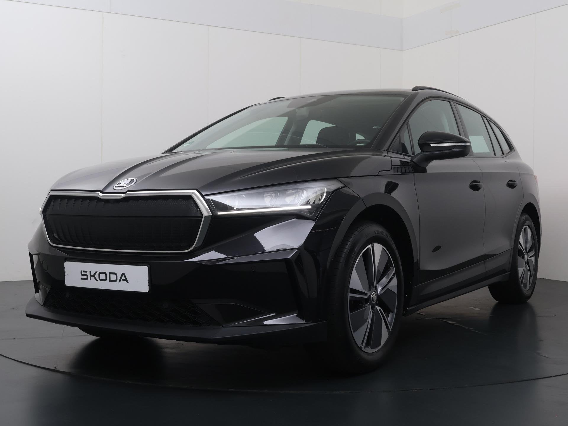 Skoda Enyaq iV 60 | 180 PK | SoH % | Cruise Control | Climat, Achterwielaandrijving, Gebruikt, Leder en Stof, Zwart