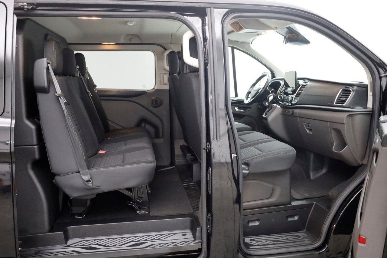 Ford Transit Custom 2.0 TDCI 130pk L1H1 Automaat D.C. Limite, Auto's, Euro 6, 4 cilinders, Zwart, Diesel
