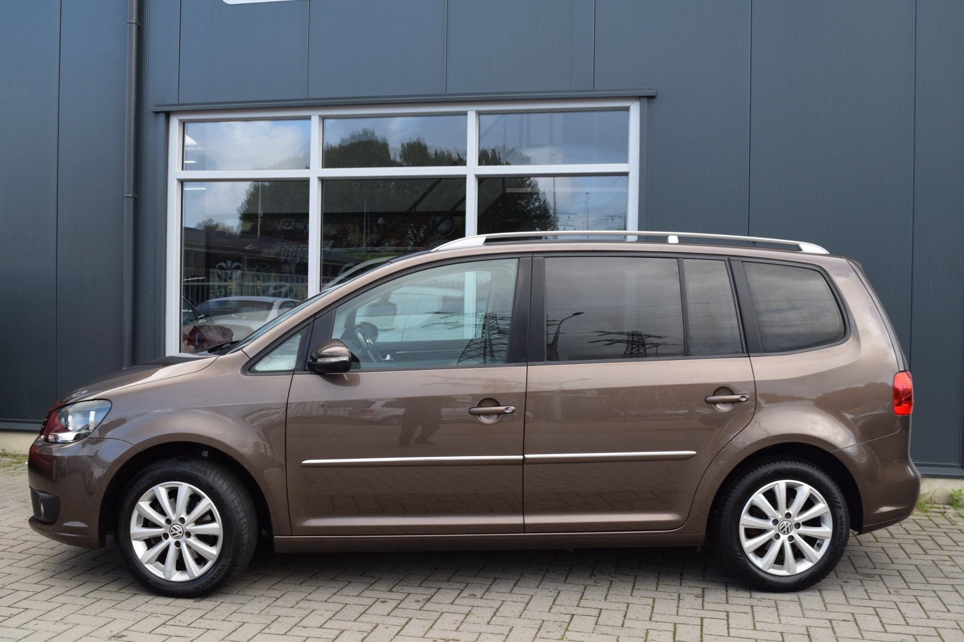 Volkswagen Touran 1.2 TSI Highline BlueMotion | Clima | Crui, 730 kg, Gebruikt, Zwart, 4 cilinders