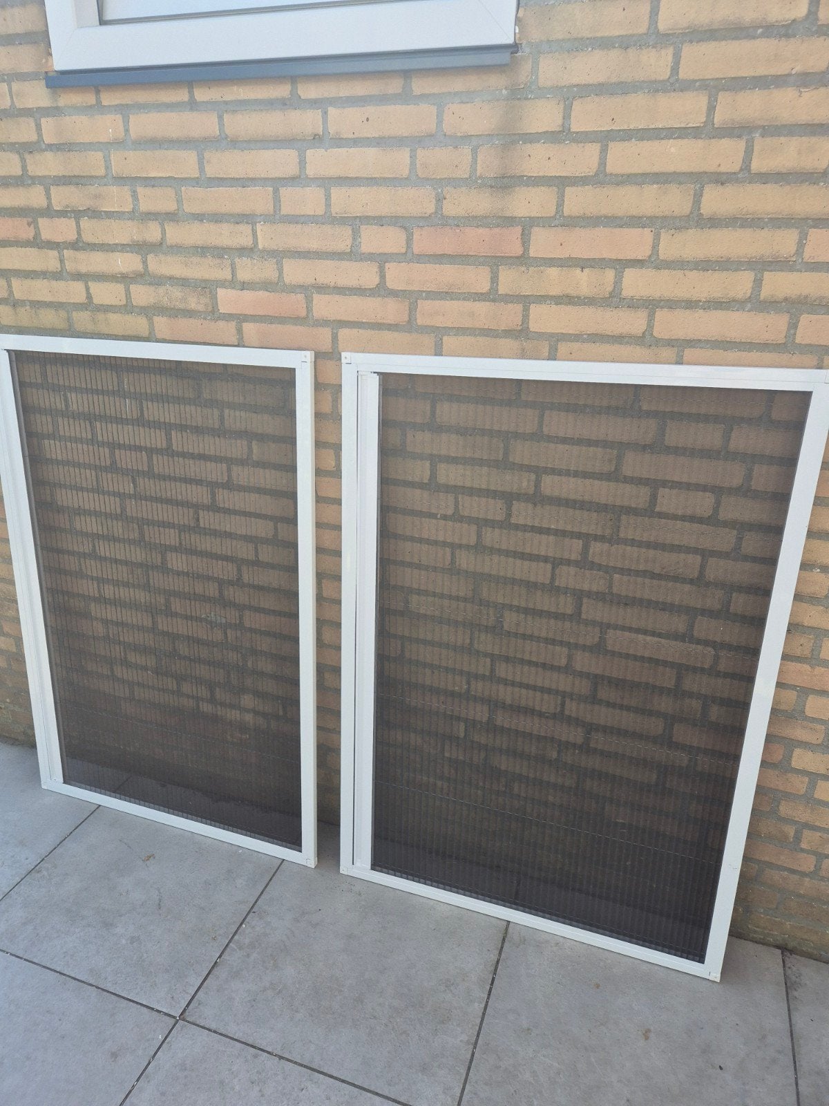 Twee uitschuifbare raamhorren (91x131 cm), Ophalen, Gevelraam of Ruit, Gebruikt, 80 tot 120 cm