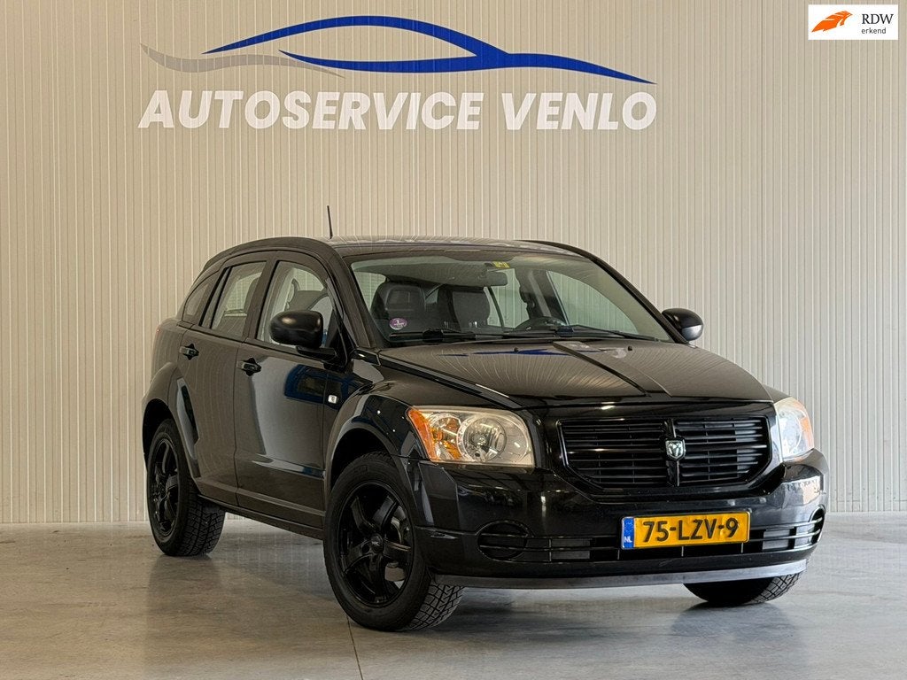 Dodge Caliber 2.0 Raw Edition Zwart, Auto's, Dodge, 450 kg, Gebruikt, Zwart, Origineel Nederlands
