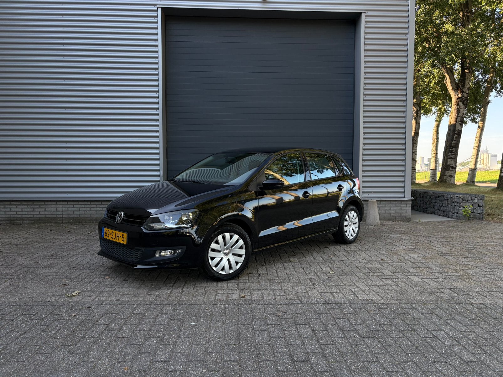 Volkswagen Polo 1.4 2011 Zwart, Auto's, Voorwielaandrijving, 970 kg, Stof, 40 €/maand