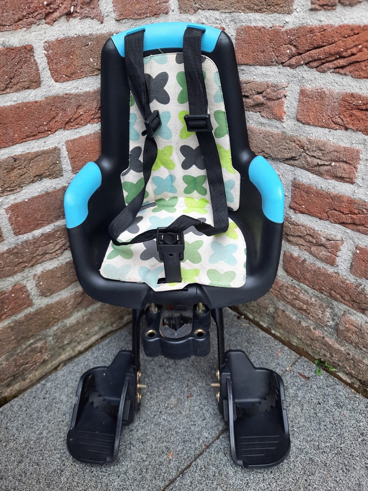 Fiets-stoeltje voor aan het stuur., Ophalen