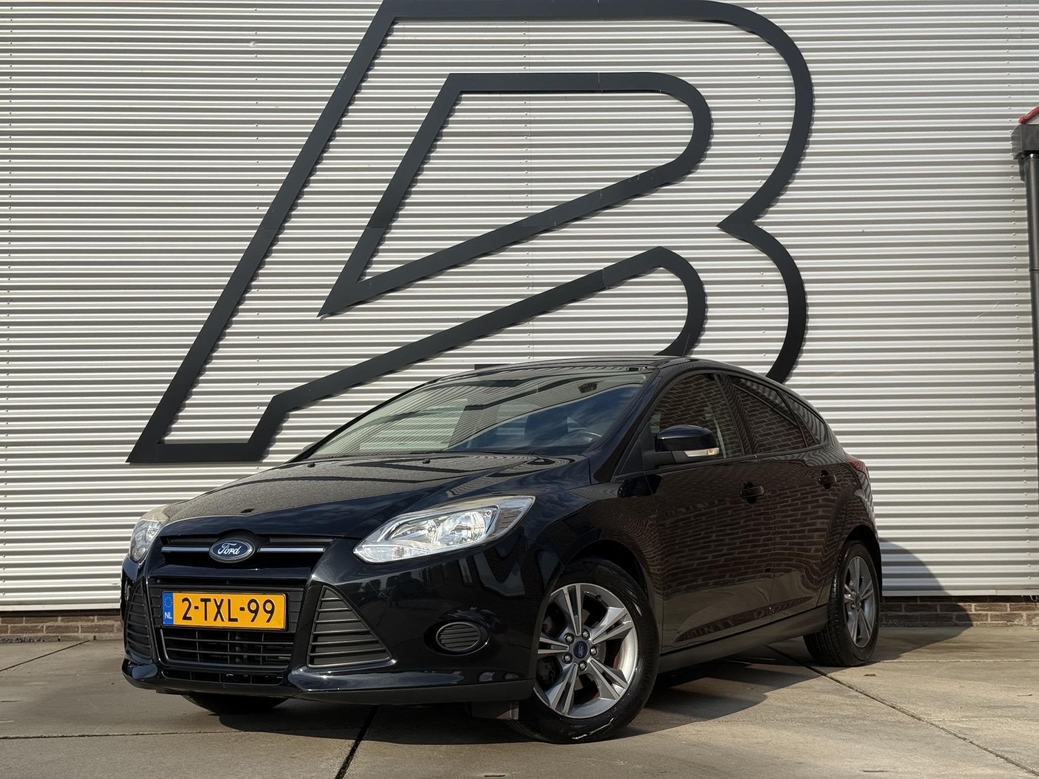 Ford Focus 1.0 EcoBoost Edition 2e Eigenaar|Navi|Airco|Cruis, Auto's, Gebruikt, 635 kg, Zwart, Bedrijf
