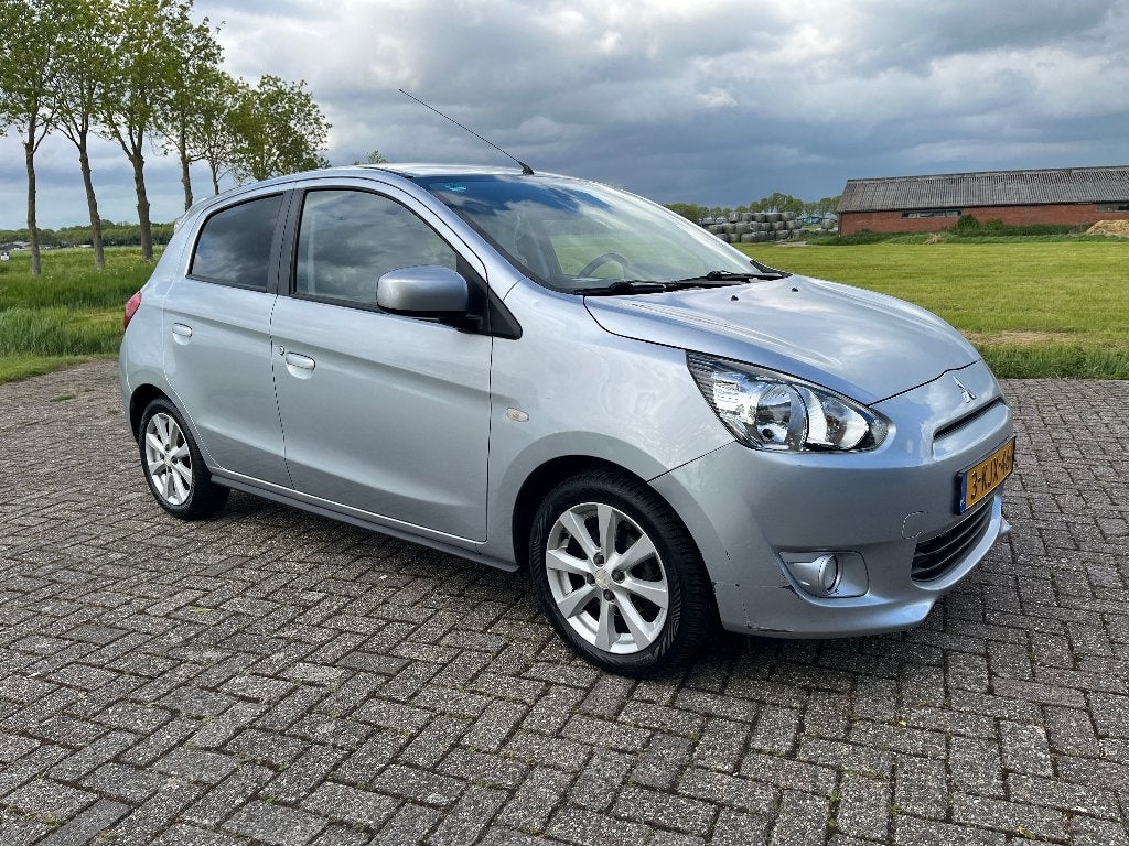 Mitsubishi Space Star 1.2 MPI 59KW 2013 Grijs, Auto's, Mitsubishi, Voorwielaandrijving, Stof, 23 km/l, Origineel Nederlands