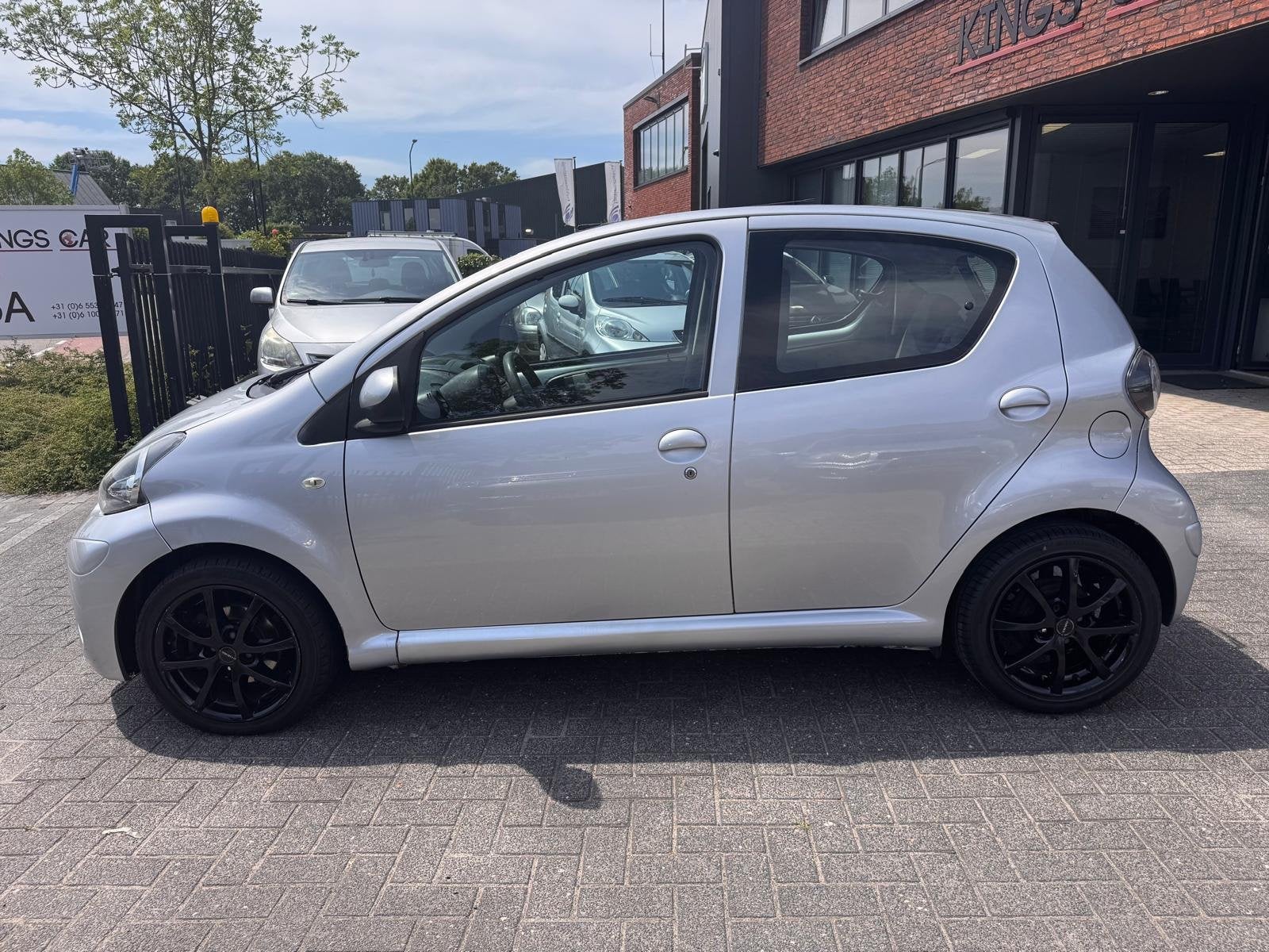 Toyota Aygo 1.0 VVT-i Dynamic Orange 5 DRS AIRCO LED NIEUWE, Voorwielaandrijving, Euro 5, Gebruikt, 4 stoelen