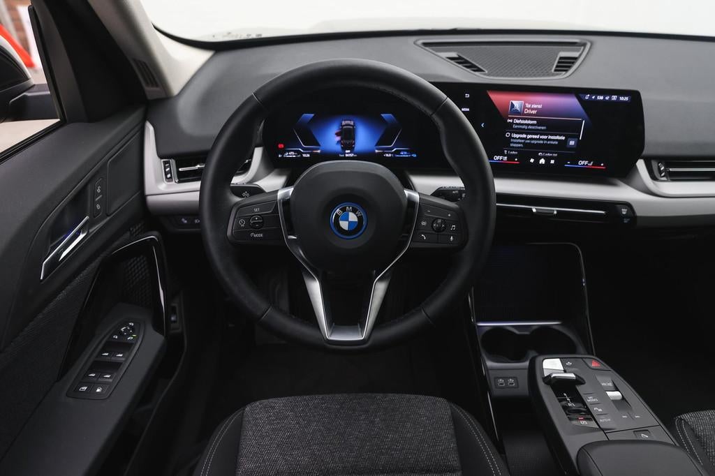BMW X1 xDrive25e Automaat / Trekhaak / Achteruitrijcamera /, Stof, Gebruikt, Euro 6, Zwart