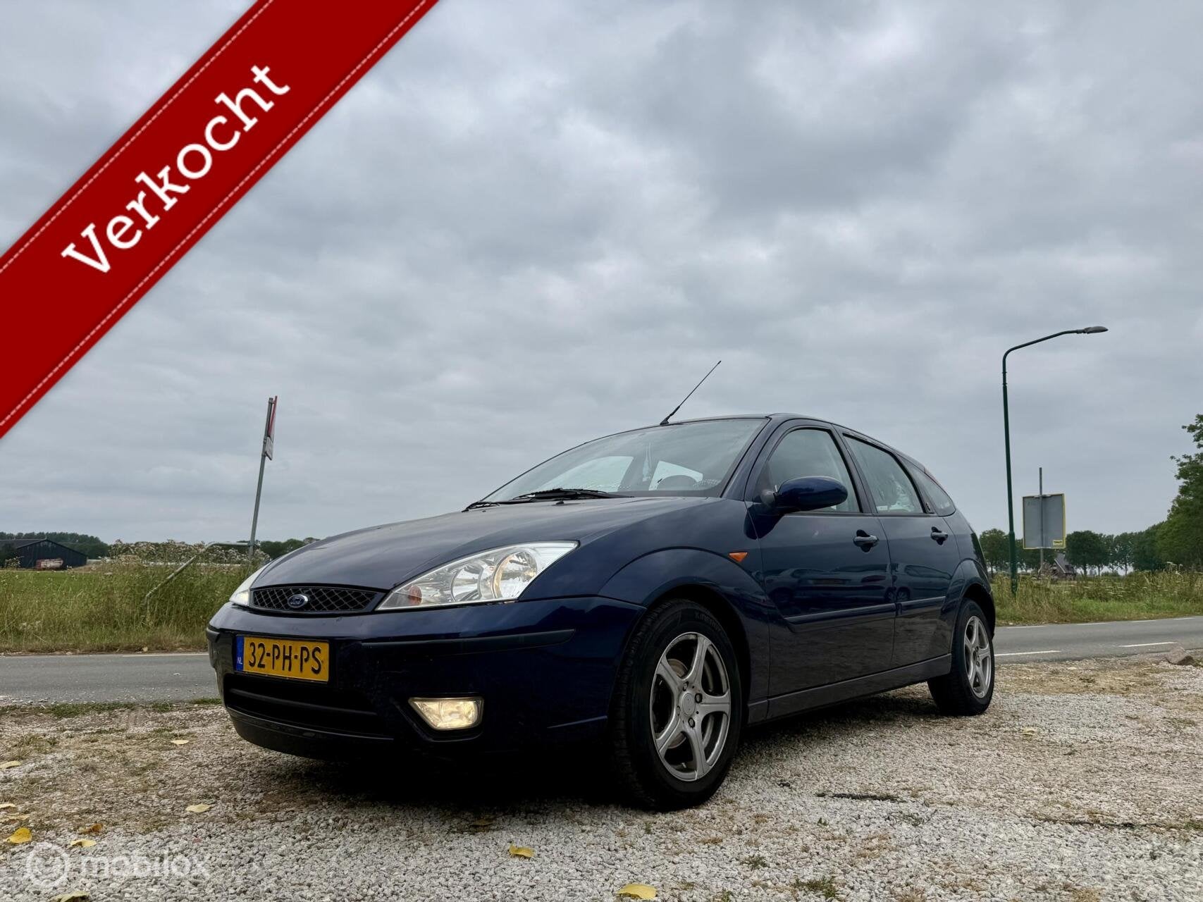 Ford Focus 1.6-16V Ghia, BJ 2004 Automaat, APK Juli 2027, 1596 cc, Gebruikt, Blauw, 49 €/maand