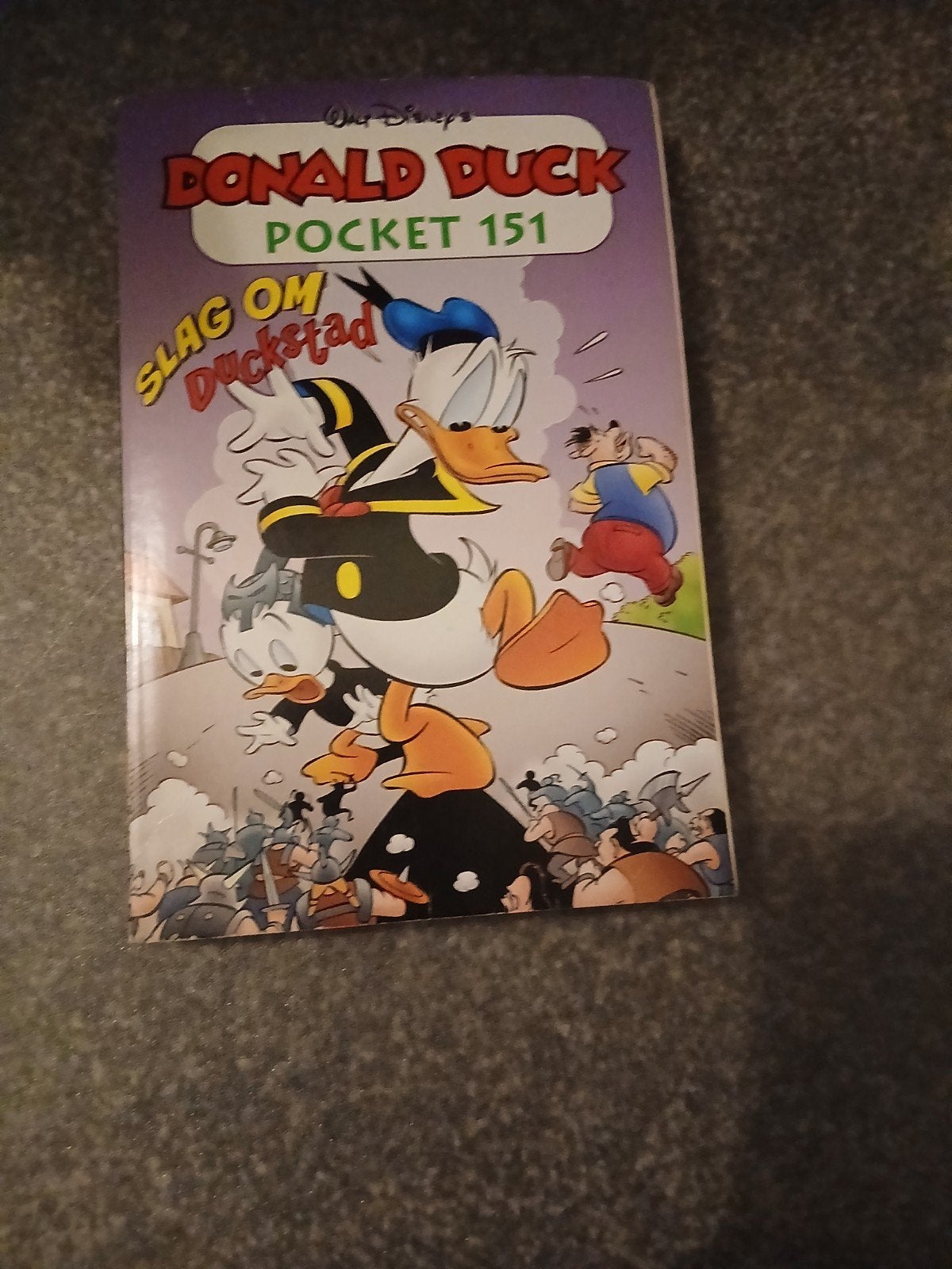 Donald Duck Pocket 151: Slag om Duckstad, Ophalen