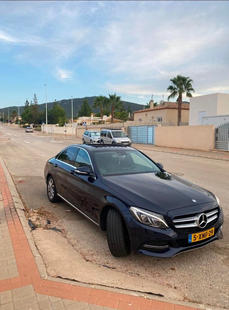Mercedes-Benz C-Klasse C200 2.0 184PK 2014 Blauw, Auto's, Achterwielaandrijving, Blauw, Handgeschakeld, 19 km/l
