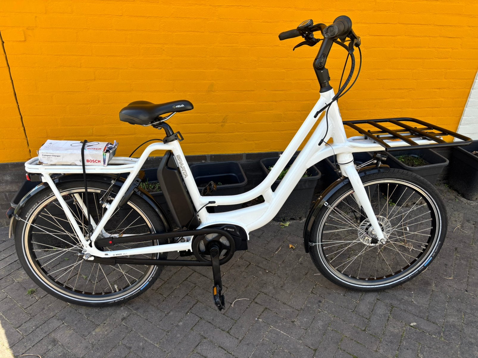 Sparta Bosch middenmotor ebike 2324km (vakantie,bezorg etc.), Fietsen en Brommers, Ophalen, Zo goed als nieuw, 50 km per accu of meer