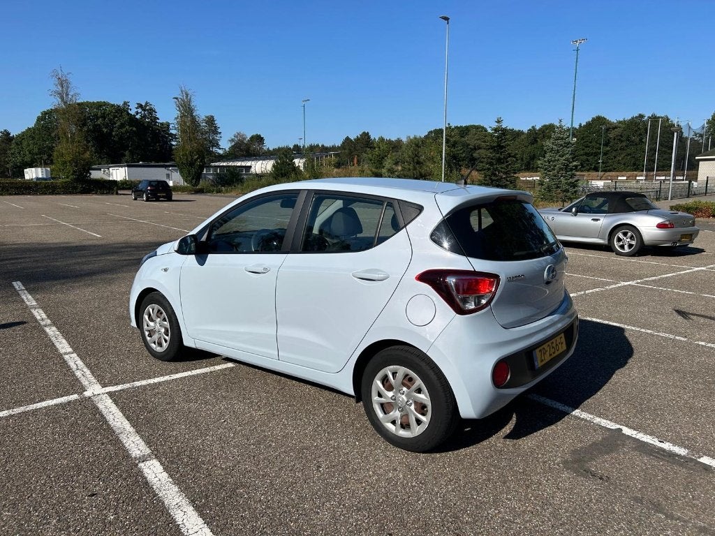 Hyundai i10 1.0i 66pk 2019 Blauw, Auto's, Voorwielaandrijving, Stof, 31 €/maand, Origineel Nederlands