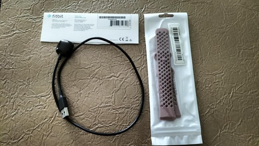 Fitbit oplader + nieuw oud roze bandje, Ophalen of Verzenden