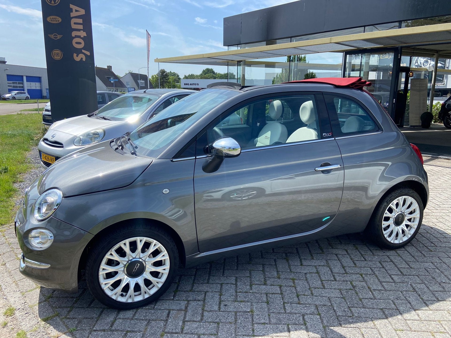 Fiat 500C 1.0 Hybrid|Navi|CC|Cabrio|Sensor, Auto's, Fiat, Met garantie (alle), 4 stoelen, Leder, Handgeschakeld