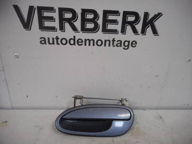 PORTIERGREEP BUITEN LINKS ACHTER Omega B (25 / 26 / 27), Bahnhofsplatz 65423 Rüsselsheim am Main, DE, Gebruikt, Deur, Opel