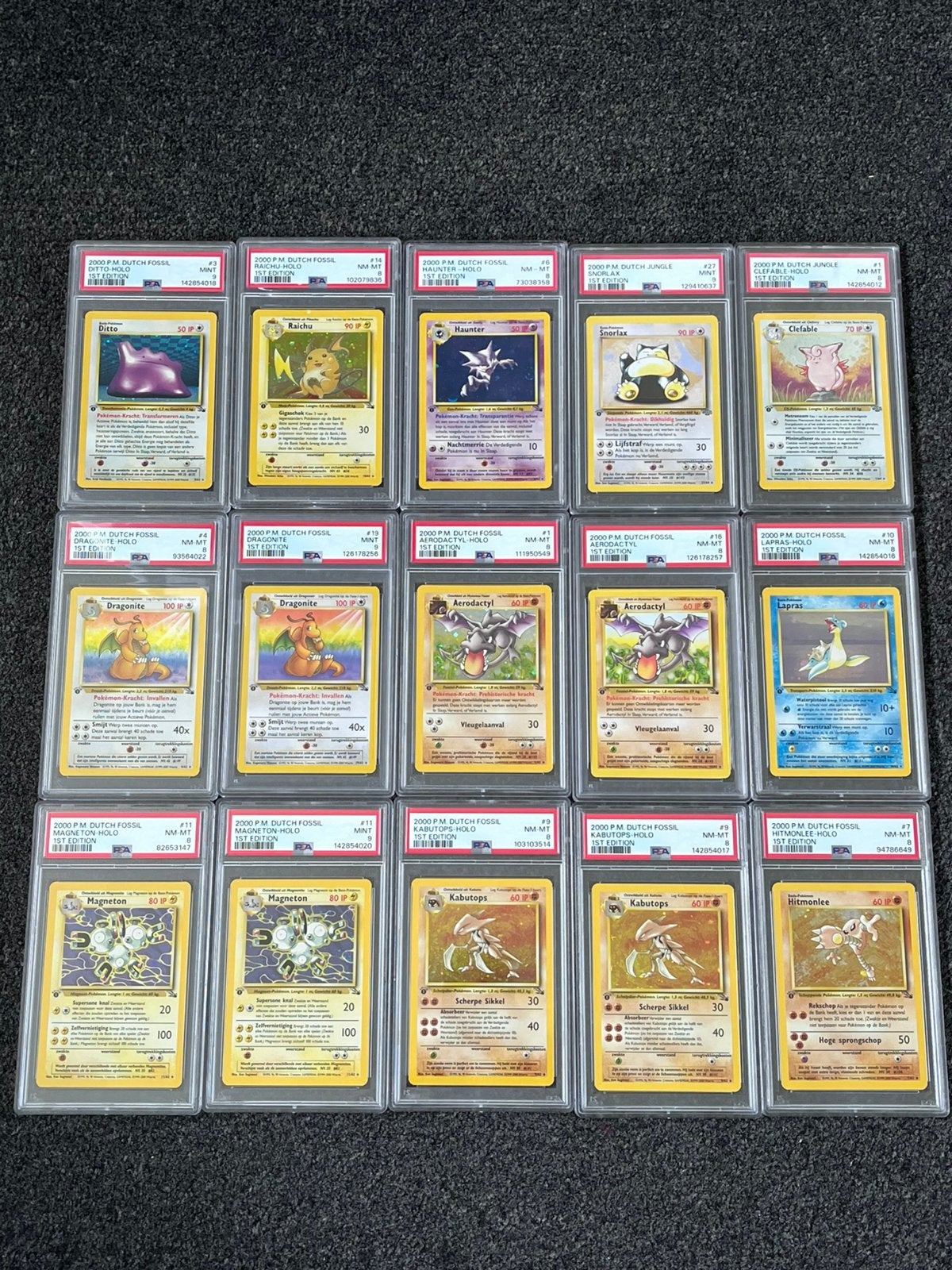 Pokémon 15 PSA 8/9 LOW POP Dutch 1st ed. Fossil/jungle cards, Ophalen of Verzenden, Zo goed als nieuw, Meerdere kaarten, Foil