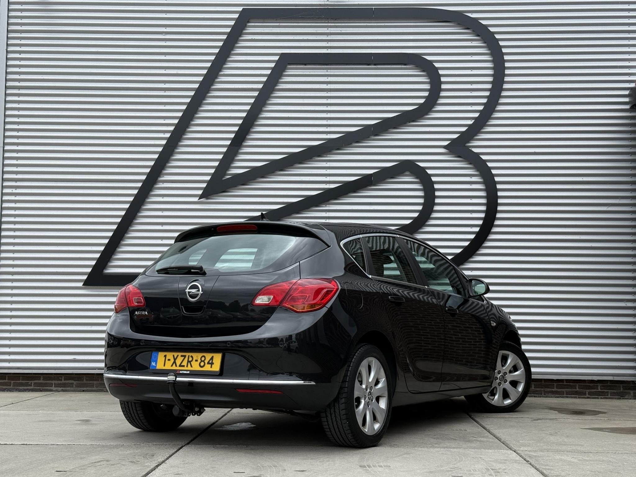 Opel Astra 1.4 Turbo Blitz 1e Eigenaar|Airco|Cruise|Elek Ram, Auto's, Voorwielaandrijving, Euro 5, Stof, Gebruikt