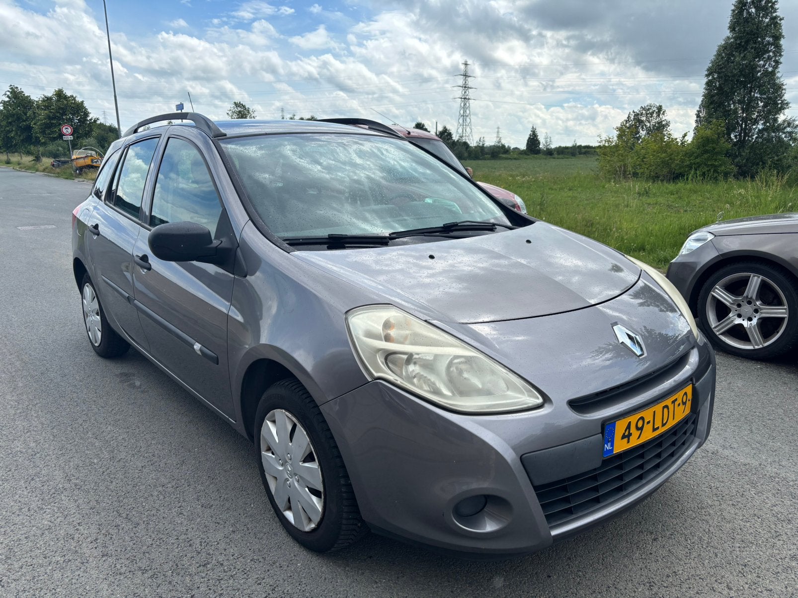 Renault Clio 1.2 Estate 2010 AIRCO/NAVI Grijs, Auto's, Voorwielaandrijving, 535 kg, 74 pk, 4 cilinders